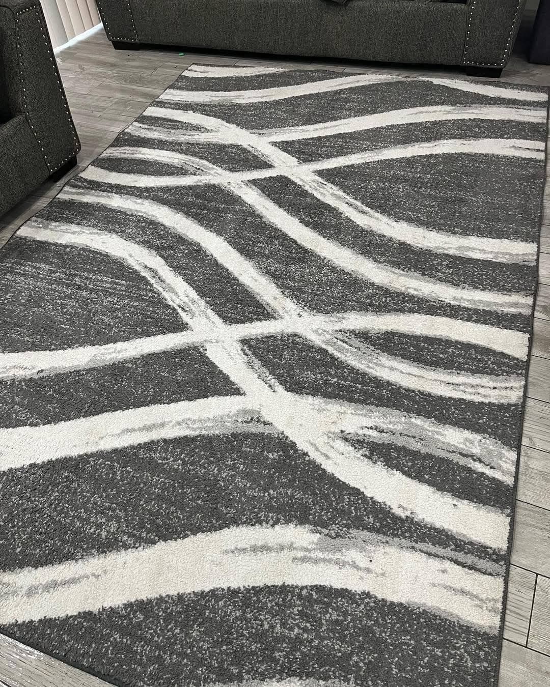 The same area rug after cleaning, bright and refreshed